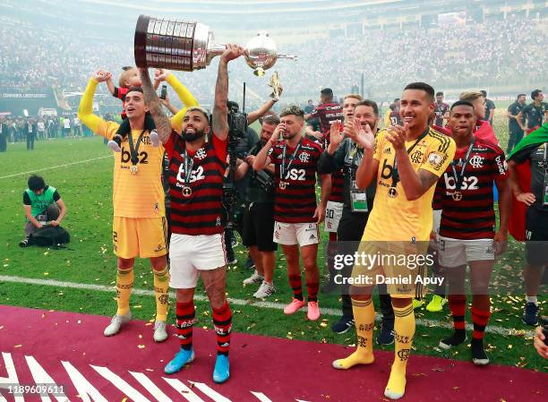 Gabriel Barbosa of Flamengo lifts the trophy after winning the during the final match of Copa CONMEBOL Libertadores 2019 between Flamengo and River...