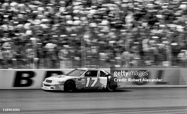 Driver Darrell Waltrip speeds past the grandstands during the 1989 Valley 500 on April 9, 1989 at the Bristol Motor Speedway in Bristol, Tennessee.