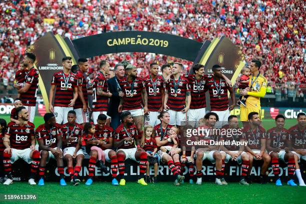 Players of Flamengo sit in the podium after receiving their medals after during the final match of Copa CONMEBOL Libertadores 2019 between Flamengo...