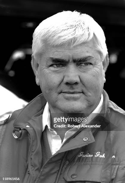 Car owner Junior Johnson pauses in the Daytona International Speedway garage area prior to the start of the 1988 Daytona 500 on February 14, 1988 in...