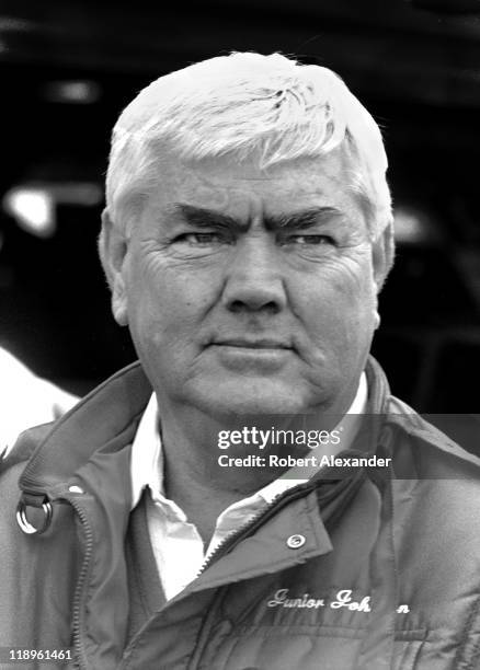 Car owner Junior Johnson pauses in the Daytona International Speedway garage area prior to the start of the 1988 Daytona 500 on February 14, 1988 in...