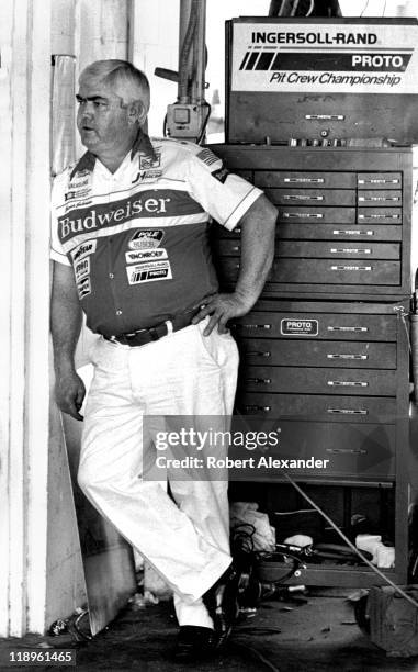 Car owner Junior Johnson relaxes in the Daytona International Speedway garage during a practice session for the 1984 Daytona 500 on February 18, 1984...