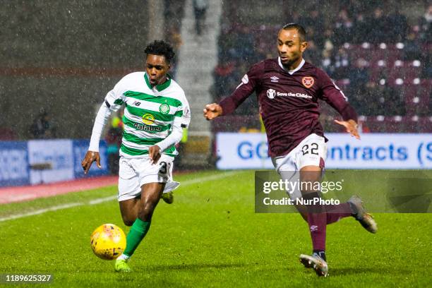 Jeremie Frimpong of Celtic and Loic Damour of Hearts compete for the ball during the Scottish Premier League match between Hearts and Celtic at...