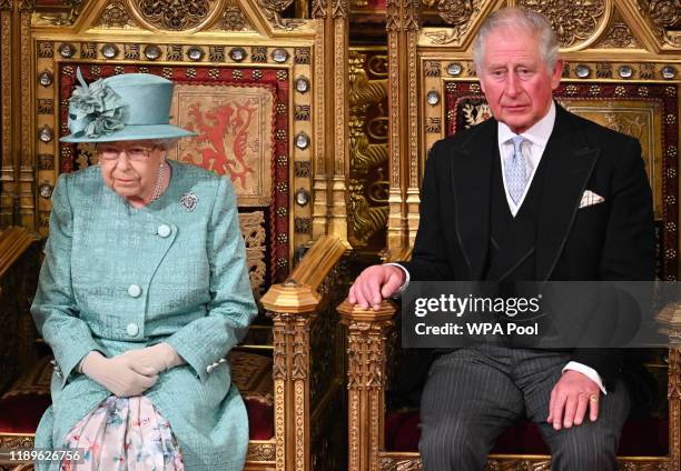 Queen Elizabeth II and Prince Charles, Prince of Wales attend the State Opening of Parliament in the House of Lord's Chamber on December 19, 2019 in...