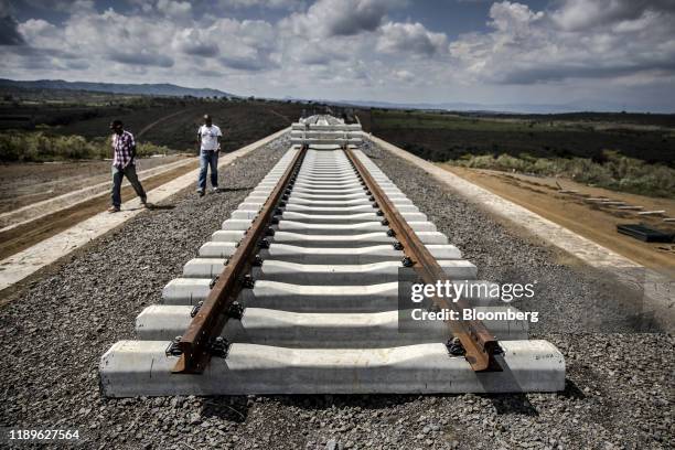 Bloomberg Pictures Of The Year 2019: Extreme Business. Incomplete rail tracks for the Standard Gauge Railway line lay on the ground near Duka Moja,...