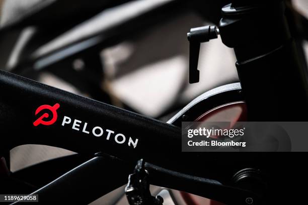 The Peloton Interactive Inc. Logo is displayed on a stationary bicycle on display at the company's showroom on Madison Avenue in New York, U.S., on...