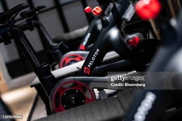 Peloton Interactive Inc. Stationary bicycles sit on display at the company's showroom on Madison Avenue in New York, U.S., on Wednesday, Dec. 18,...