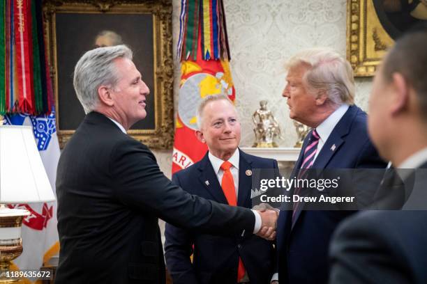 Representative Jeff Van Drew of New Jersey, who has announced he is switching from the Democratic to Republican Party, looks on as House Minority...