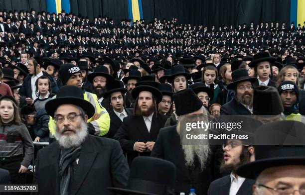 Members of Satmar community attend annual Satmar 21 Kislev event as a day of thanksgiving at 355 Marcy Avenue.