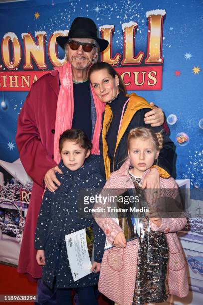 Reiner Schoene, his wife Anja Schoene, their daughter Charlotte-Sophie Schoene and a friend of her attend the 16th Roncalli Weihnachtscircus at...
