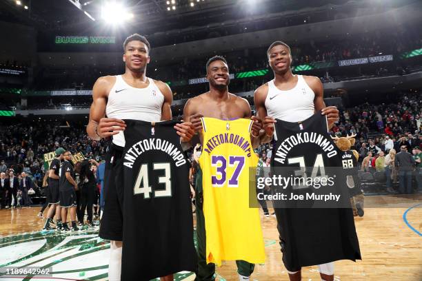 Giannis Antetokounmpo of the Milwaukee Bucks, Thanasis Antetokounmpo of the Milwaukee Bucks, and Kostas Antetokounmpo of the Los Angeles Lakers...