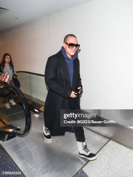 Evan Ross is seen at Los Angeles International Airport on December 19, 2019 in Los Angeles, California.