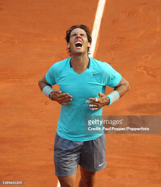 Rafael Nadal of Spain celebrates victory during his men's singles final match against Novak Djokovic of Serbia on day fifteen of the French Open at...