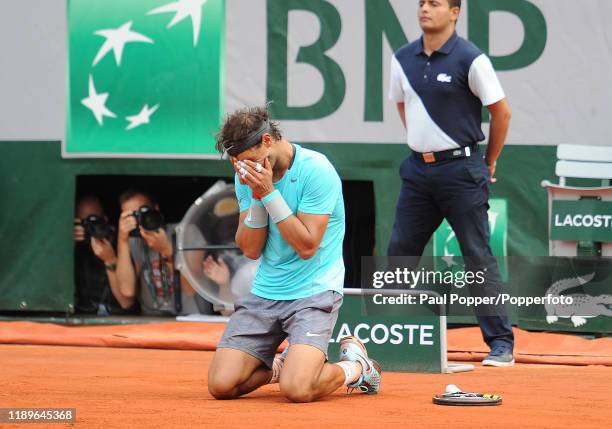 Rafael Nadal of Spain celebrates winning championship point during his men's singles final match against Novak Djokovic of Serbia on day fifteen of...