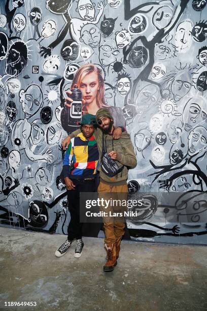 Cavier Coleman and JD Barnes attend the private opening of the Good Luck Dry Cleaners Bowery location at 3 East 3rd on December 19, 2019 in New York...