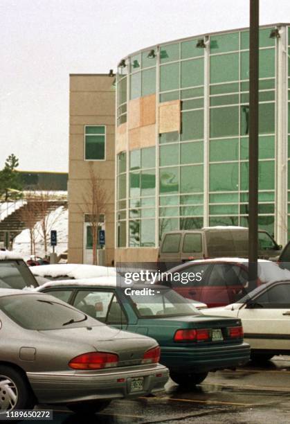 View from the parking lot at the rear of Columbine High School in Littleton, CO, shows the cafeteria and library with windows missing 22 April at the...