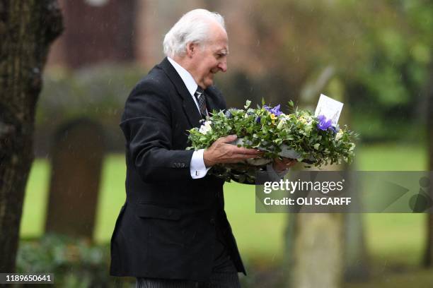 Flowers are taken to the church as family and friends of the victim of the terror attack in Fishmongers' Hall on London Bridge, University of...