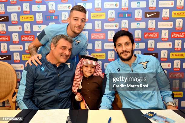 Sergej Milinkovic Savic, Club manager SS lazio Angelo Peruzzi and Luis Albertoof SS Lazio attends a meet & greet of Sunday's Italian Supercup match...