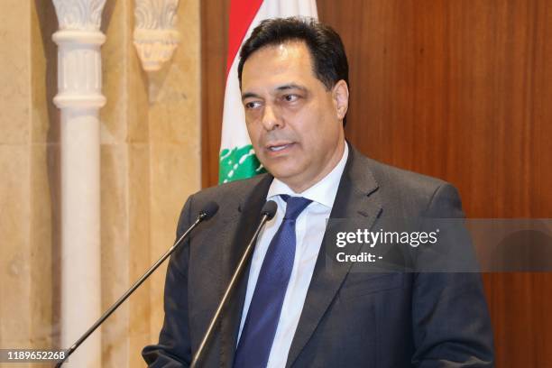 Prime Minister-designate Hassan Diab gives a statement following his meeting with outgoing prime Minister Saad Hariri in Beirut on December 20, 2019....