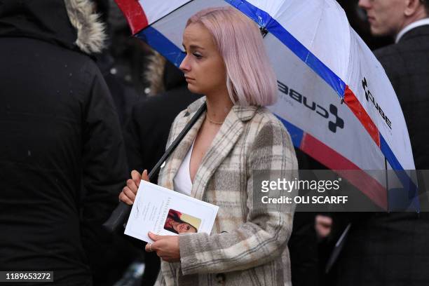 Friends and family members leave after attending a memorial service for University of Cambridge graduate Saskia Jones, a victim of the Fishmongers'...