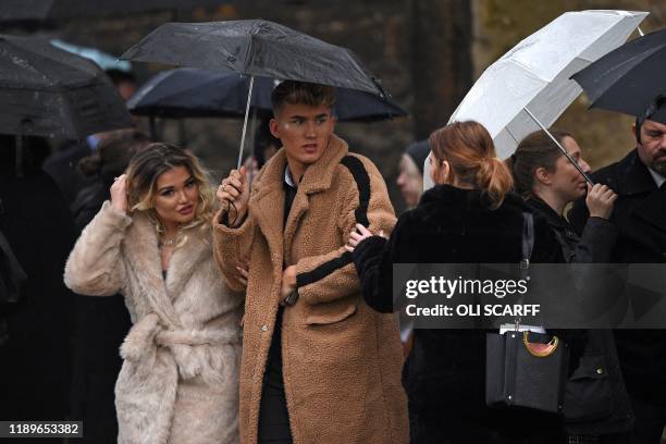 Friends and family members leave after attending a memorial service for University of Cambridge graduate Saskia Jones, a victim of the Fishmongers'...