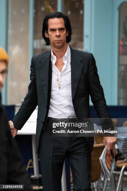 Musician Nick Cave leaves after he attended and sang at the funeral of London Bridge terror attack victim Jack Merritt at Great St Mary's Church in...