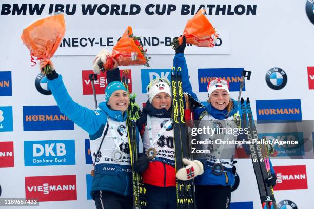 Tiril Eckhoff of Norway takes 1st place, Justine Braisaz of France takes 2nd place, Marketa Davidova of Czech Republic takes joint 3rd place during...