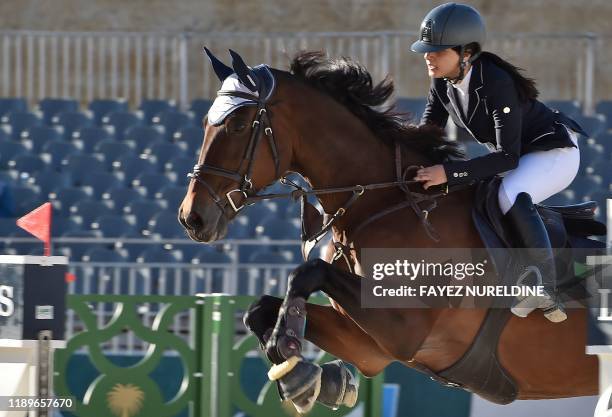Saudi jockey Wafa Alhassoun competes during the Diriyah Equestrian Festival near the capital Riyadh, on December 20 where male and female riders are...