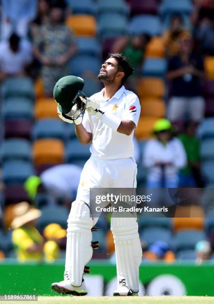 Babar Azam of Pakistan celebrates scoring a century during day four of the 1st Domain Test between Australia and Pakistan at The Gabba on November...