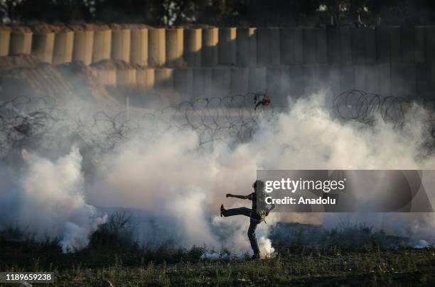 Israeli forces use tear gas to disperse Palestinians during the "Great March of Return" demonstrations at Israel-Gaza border near Al Bureij Refugee...