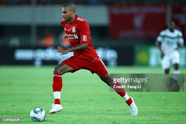 David N'Gog of Liverpool controls the ball during the pre-season friendly match between Guangdong Sunray Cave and Liverpool at Guangdong Provincial...
