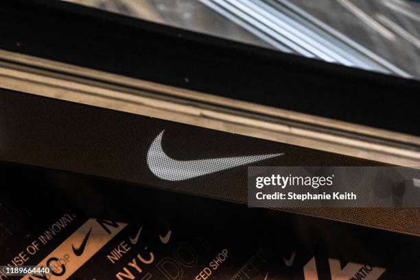 Nike logo is seen at the Nike flagship store on 5th Ave. On December 20, 2019 in New York City. Revenue in the North American market, which accounts...