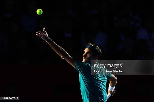 Roger Federer of Switzerland plays a shot during 'The Greatest Match' between Roger Federer and Alexander Zverev at Plaza Mexico on November 23, 2019...