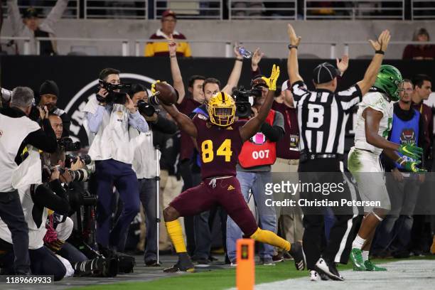 Wide receiver Frank Darby of the Arizona State Sun Devils celebrates after scoring on a 26 yard touchdown reception against the Oregon Ducks during...