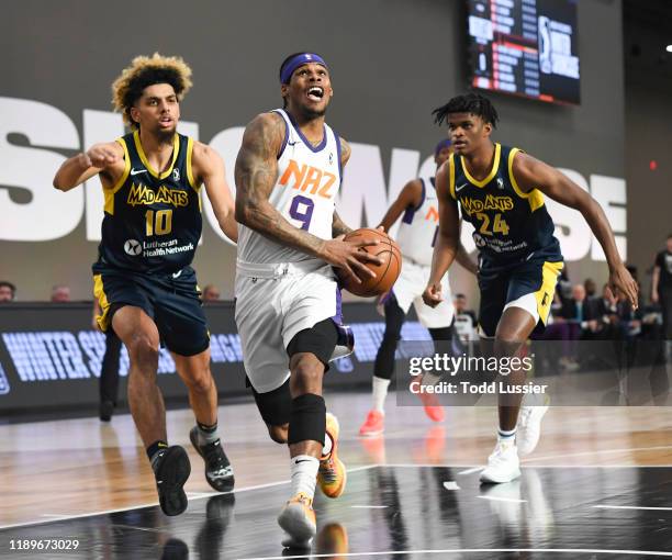 Ahmed Hill of the Northern Arizona Suns handles the ball against the Fort Wayne Mad Ants during the NBA G League Winter Showcase at Mandalay Bay...