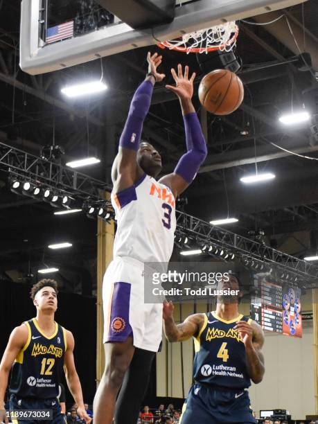 Norense Odiase of the Northern Arizona Suns slam dunks against the Fort Wayne Mad Ants during the NBA G League Winter Showcase at Mandalay Bay Events...