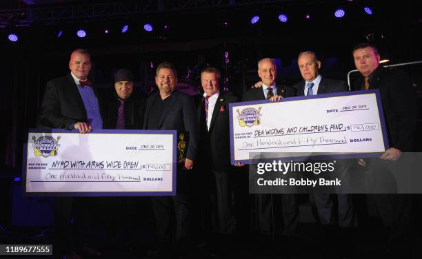 James L. Dolan, Detective Kevin Schroeder, Michael J. Palladino and Steven Van Zandt attend the 5th Annual Little Steven's Policeman's Ball at...