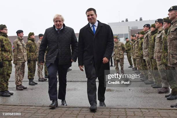 Prime Minister Boris Johnson, alongside Estonian Prime Minister Juri Ratas, arrives at the Tapa military base near Tallinn, Estonia, to meet British...