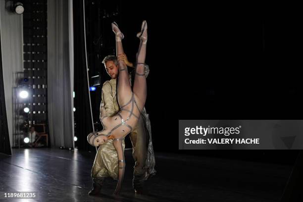 Dancers of the Monte-Carlo ballet attend, in the backstage, the rehearsal of the ballet show "Coppel-i.A" a creation by French dancer and...