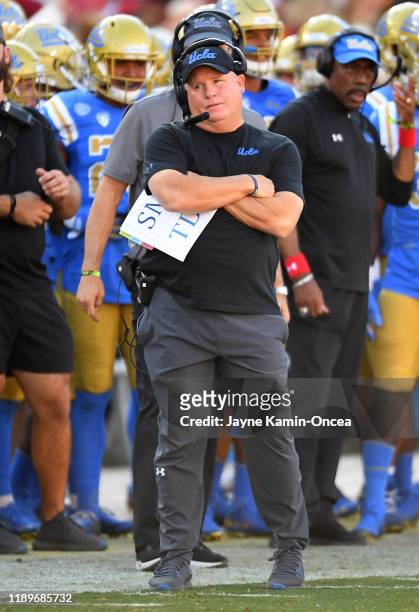 Head coach Chip Kelly of the UCLA Bruins looks on during the game against the USC Trojans at the Los Angeles Memorial Coliseum on November 23, 2019...