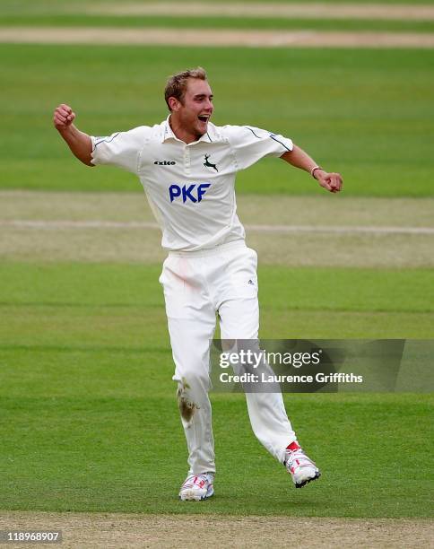 Stuart Broad of Nottinghamshire celebrates the wicket of Marcus Trescothick of Somerset during the LV County Championship match between Somerset and...
