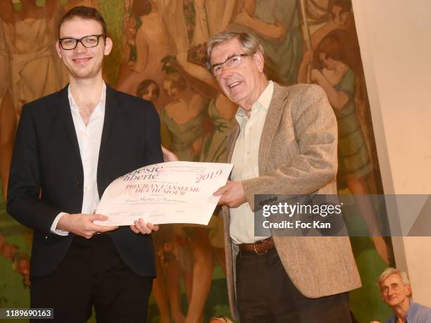 Bernard Menez awards a Poseie En Liberté competitor during "Poesie En Liberté": 2019 Awards Ceremony At Mairie Du 5eme on November 23, 2019 in Paris,...