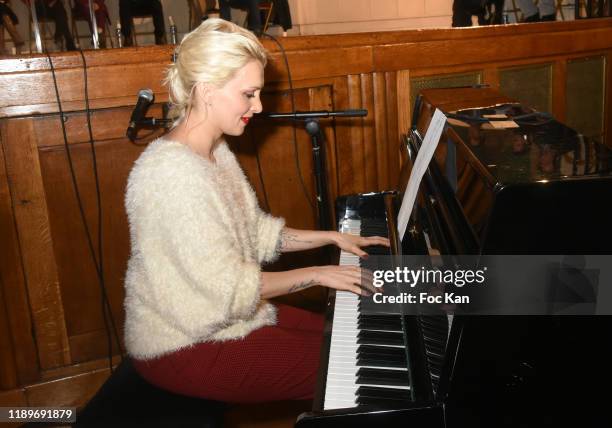 Pianist Lison Mezzina performs during the "Poesie En Liberté": 2019 Awards Ceremony At Mairie Du 5eme on November 23, 2019 in Paris, France.