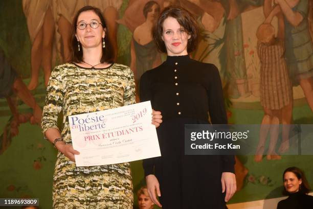 Alexandra Oppo awards a Poseie En Liberté competitor during "Poesie En Liberté": 2019 Awards Ceremony At Mairie Du 5eme on November 23, 2019 in...