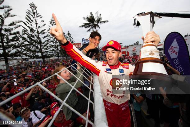 Scott McLaughlin driver of the Shell V-Power Racing Team Ford Mustang celebrates after winning thr 2019 drivers championship during the Newcastle 500...