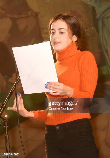 Actress : Lou Gala reads a poem during the "Poesie En Liberté": 2019 Awards Ceremony At Mairie Du 5eme on November 23, 2019 in Paris, France.