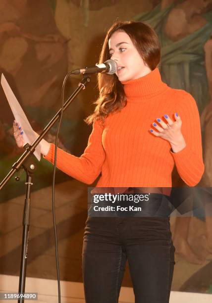 Actress : Lou Gala reads a poem during the "Poesie En Liberté": 2019 Awards Ceremony At Mairie Du 5eme on November 23, 2019 in Paris, France.