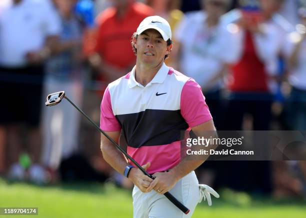 Rory McIlroy of Northern Ireland reacts to just missing a birdie putt on the first hole during the final round of the DP World Tour Championship...