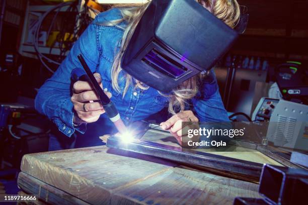 female tig welder - argon stock pictures, royalty-free photos & images