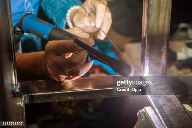 female tig welder - argon stock pictures, royalty-free photos & images